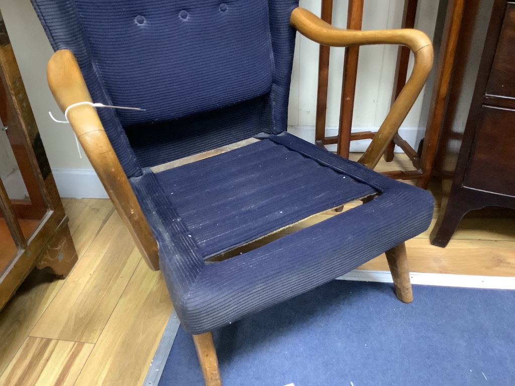 A Howard Keith Bambino armchair, (lacks seat pad) width 66cm, height 92cm